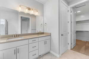 Bathroom with vanity and an enclosed shower