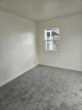 View of carpeted spare room