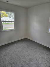 View of carpeted spare room