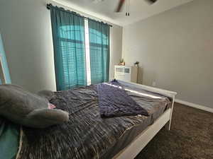 Bedroom featuring carpet flooring and ceiling fan