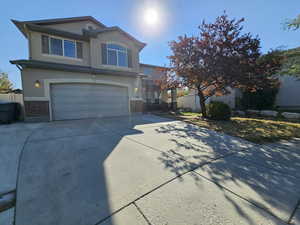 View of front of home with a garage