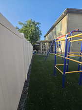 View of yard featuring a playground