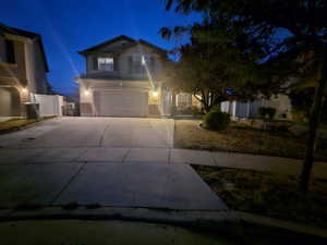 View of property with a garage