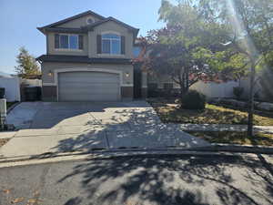 Front of property featuring a garage