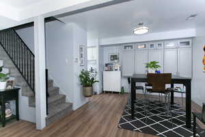 Dining area featuring dark hardwood / wood-style flooring