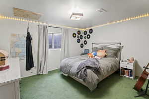 View of carpeted bedroom