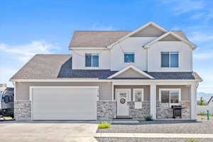 Craftsman inspired home with a garage