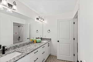 2nd floor bathroom with vanity and shower / bath combination