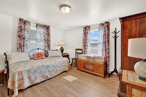 Bedroom with light wood-type flooring