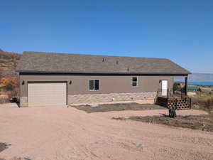 View of front of home with a garage