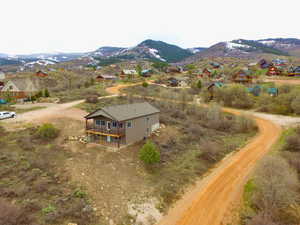 Aerial view featuring a residential view and a mountain view
