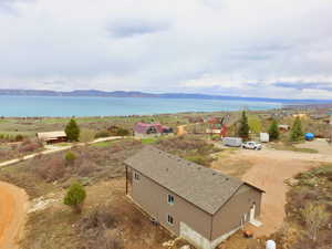 Bird's eye view featuring a water and mountain view