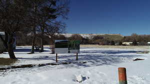 View of yard covered in snow