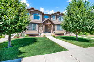 View of front of house with a front lawn