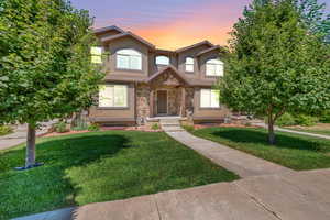 View of front of house featuring a lawn