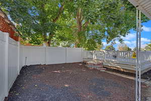 View of yard with a deck