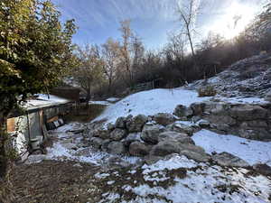 View of yard layered in snow