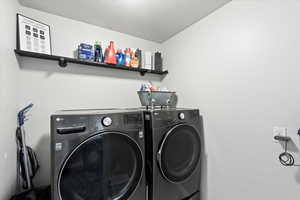 Laundry area featuring washing machine and dryer