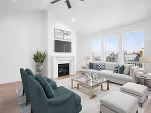 Living room featuring ceiling fan, high vaulted ceiling, and light wood-type flooring