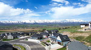 Drone / aerial view featuring a mountain view