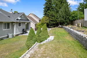 View of yard with a patio and cooling unit