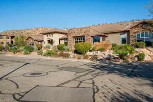 View of front of home featuring a mountain view