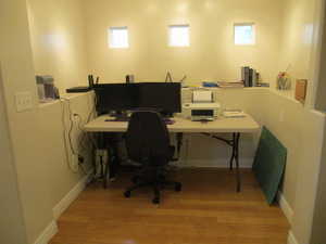 Office space featuring light hardwood / wood-style floors