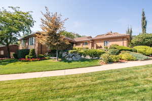 View of front of property with a front lawn