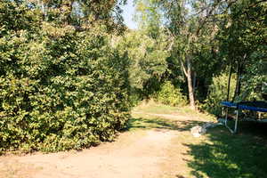 Entrance to Farmington Trail. Located across the street to the NE of property.