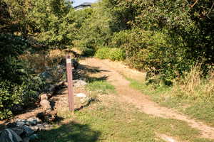 Entrance to Farmington Trail. Located across the street to the NE of property.