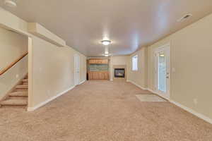 living room with light colored carpet