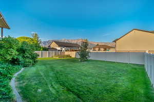 View of yard with a mountain view