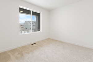 View of carpeted empty room