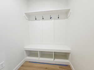 Mudroom with light wood-type flooring