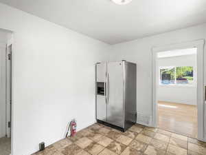 Unfurnished room with light hardwood / wood-style floors