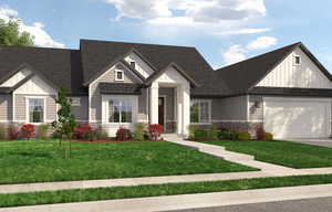 View of front facade with a garage and a front yard