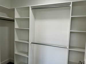 View of spacious closet in primary bedroom