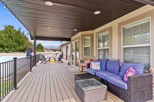 Wooden terrace with an outdoor hangout area