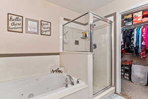 Bathroom with plus walk in shower