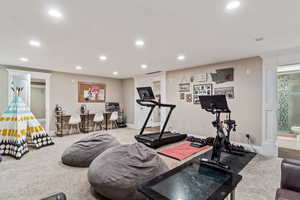 Exercise area featuring carpet flooring