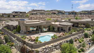 Exterior space with a patio area, an outdoor living space, a residential view, and a fenced in pool