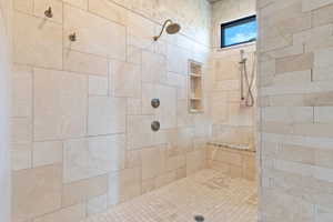 Bathroom with a tile shower