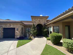 Exterior space featuring stone detailing.