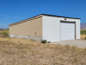 Southwest corner of shed, new siding, has power in shed.