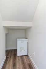 Under the stair storage with outlet for chest freezer.