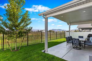 View of patio with a mountain view