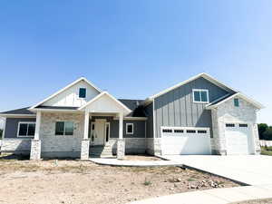 View of front of home featuring covered porch