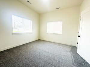 View of carpeted spare room