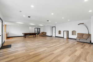 Interior space featuring light hardwood / wood-style floors and billiards