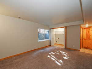 View of carpeted spare room